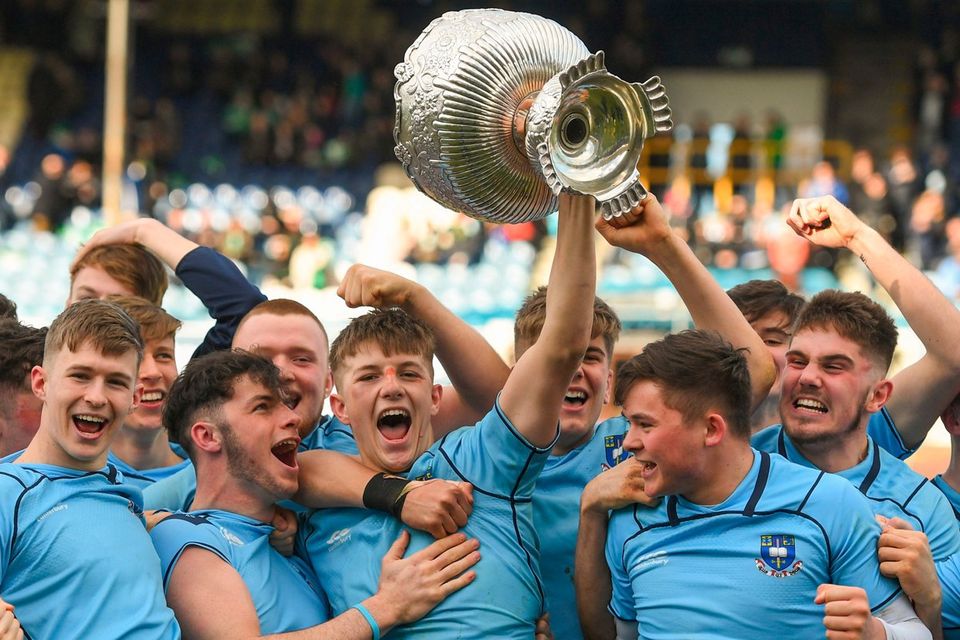 Triumph: St Michael’s captain Mark Hernan lifts the trophy after victory in the 2019 Leinster Senior Cup final. Photo: Ramsey Cardy/Sportsfile