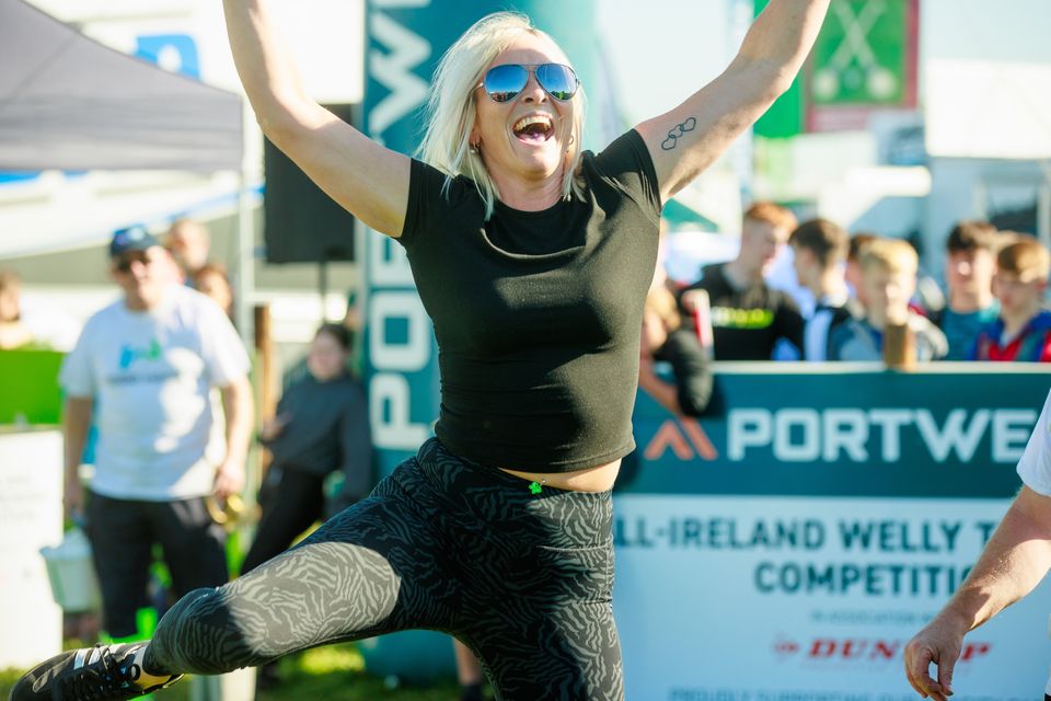 Noelle Russell from Laois celebrating her welly throwing on day two of  the National Ploughing Championships in Ratheniska. Pic: Mark Condren