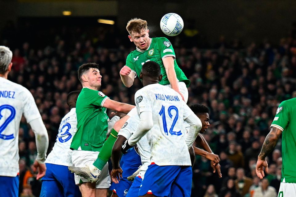 Ireland's Nathan Collins has a header on goal during the Euro 2024 Qualifier against France. Photo: Stephen McCarthy/Sportsfile