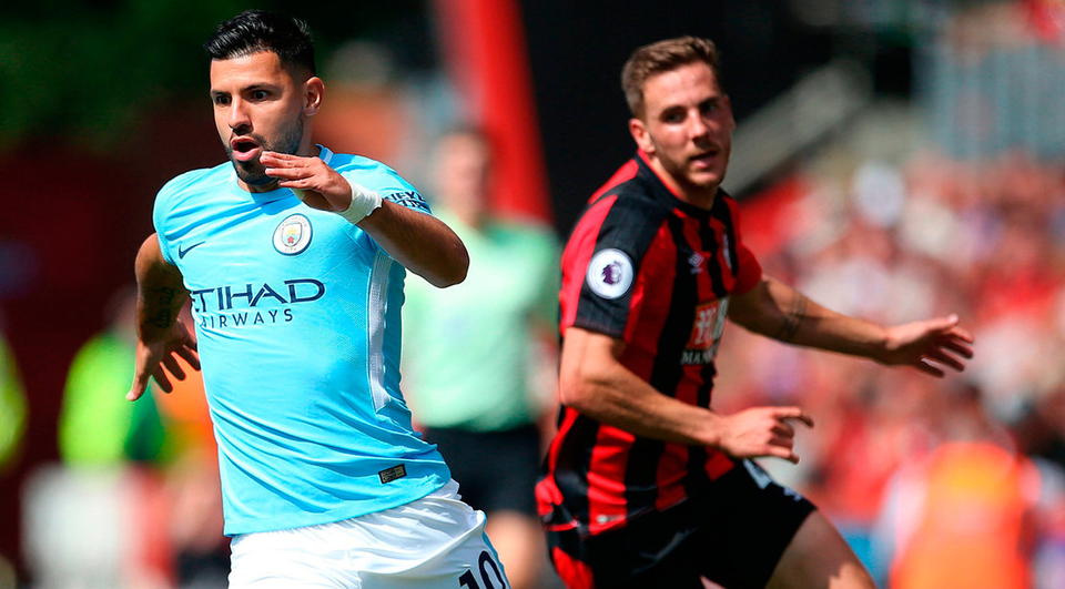 Manchester City's Sergio Aguero (left) and AFC Bournemouth's Dan Gosling in action during the match at the Vitality Stadium. Photo: Steven Paston/PA
