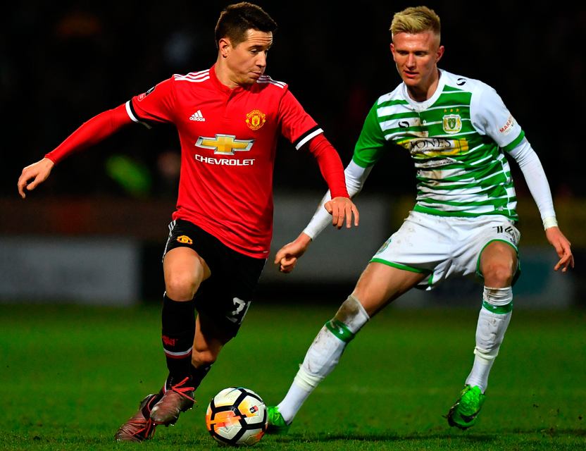 Manchester United's Ander Herrera keeps the ball from Yeovil Town's Sam Surridge. Photo: Getty Images