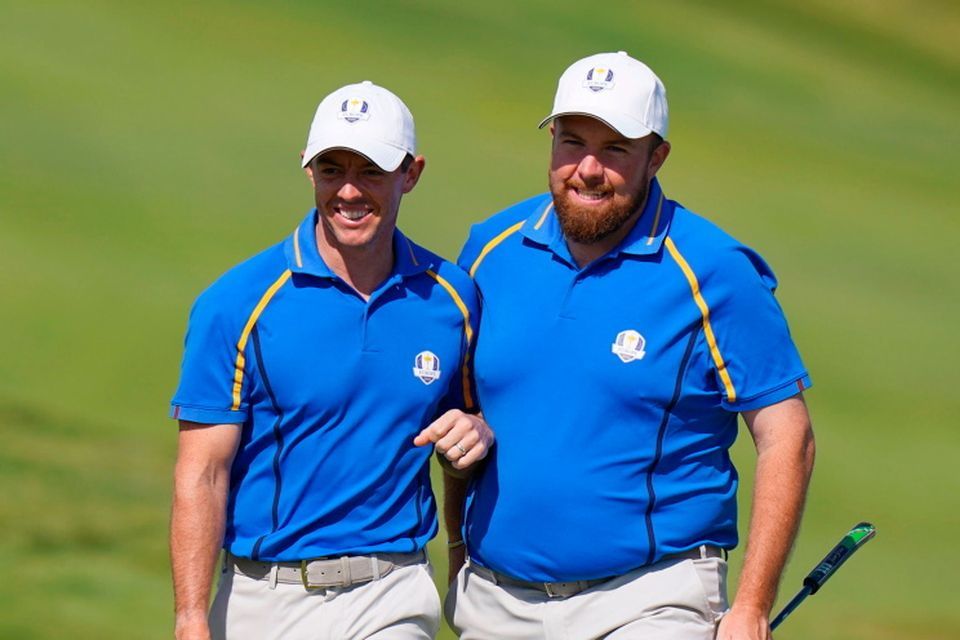 Shane Lowry, right, and Rory McIlroy of Team Europe at the last Ryder Cup