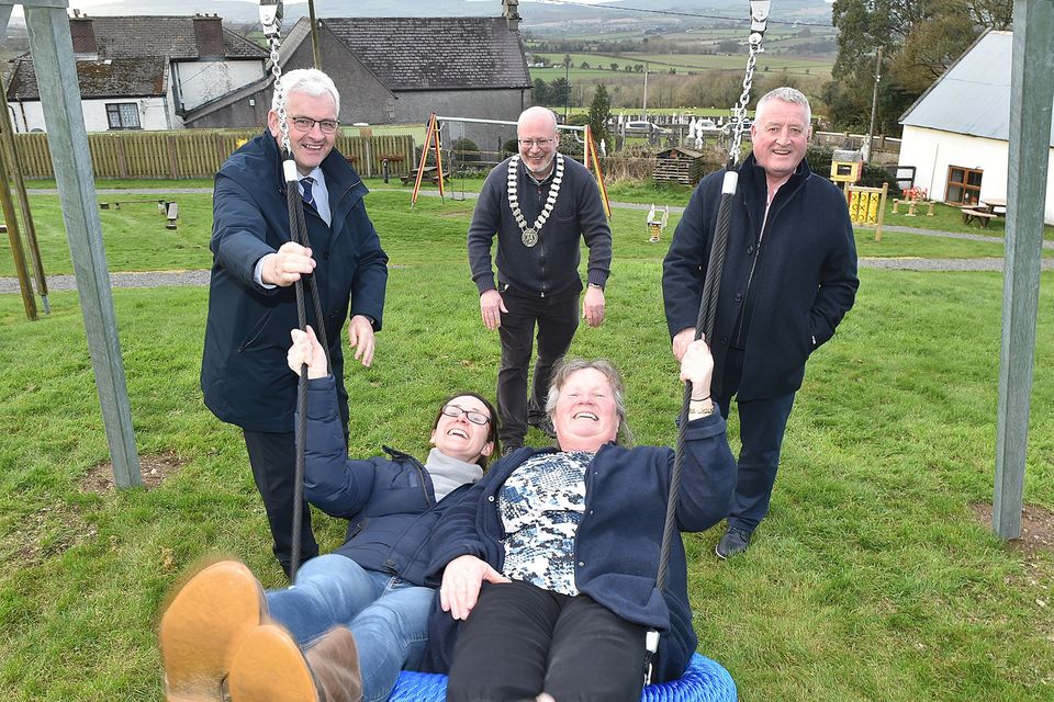 Linda Kearney (Chairperson Askamore Community Council) and local resident Mary Doran giving the push from Cllr Joe Sullivan, Cllr Fionntán Ó  Suilleabháin (leas-Cathaoirleach, Gorey Kilmuckridge Municipal District) and Cllr Donal Breen on the new swing, one of the new additions to the children's playground at Le Chéile Park, Askamore on Tuesday. Pic: Jim Campbell
