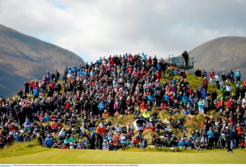 28 May 2015; Rory McIlroy putts on the 5th green. Dubai Duty Free Irish Open Golf Championship 2015, Day 1. Royal County Down Golf Club, Co. Down. Picture credit: Ramsey Cardy / SPORTSFILE