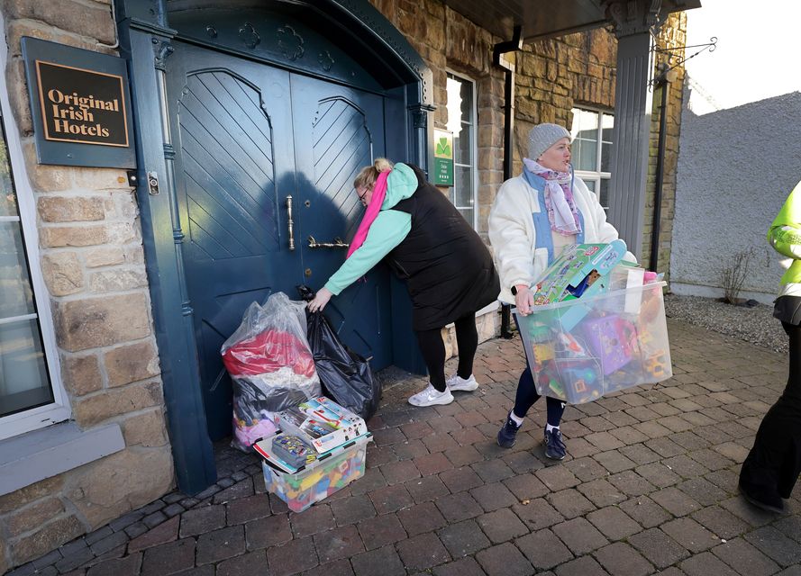 Local women leave bags of toys and clothes outside the main door of Racket Hall in Roscrea, Co Tipperary. Photo: Frank McGrath