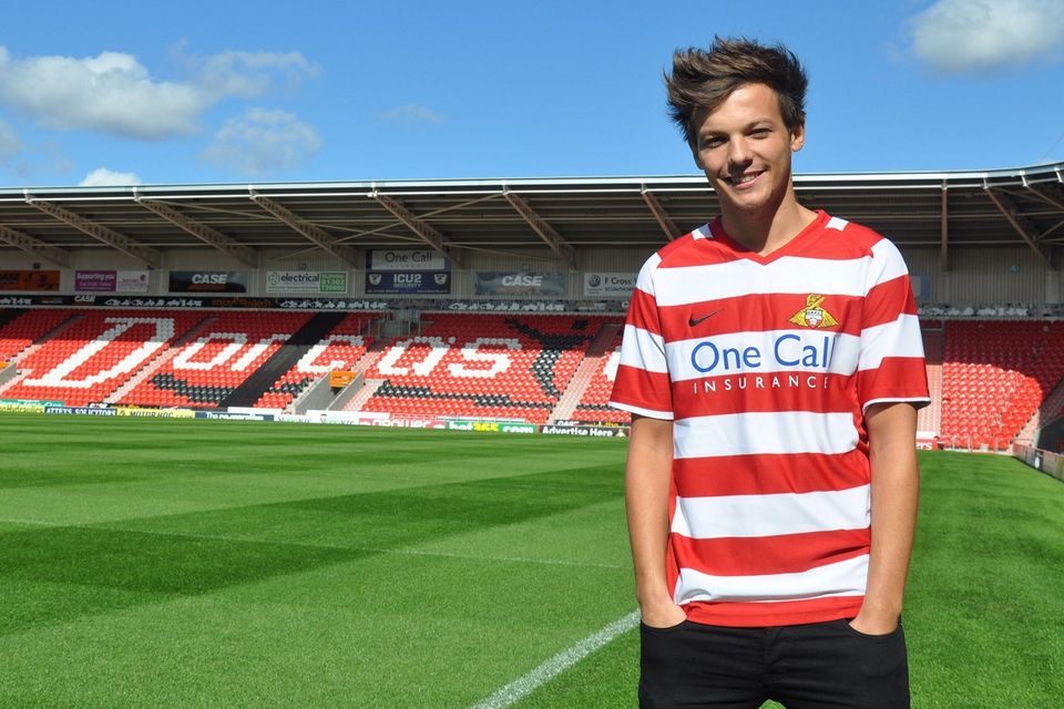 Louis Tomlinson is reported to be involved in a joint bid to buy his hometown football club Doncaster Rovers