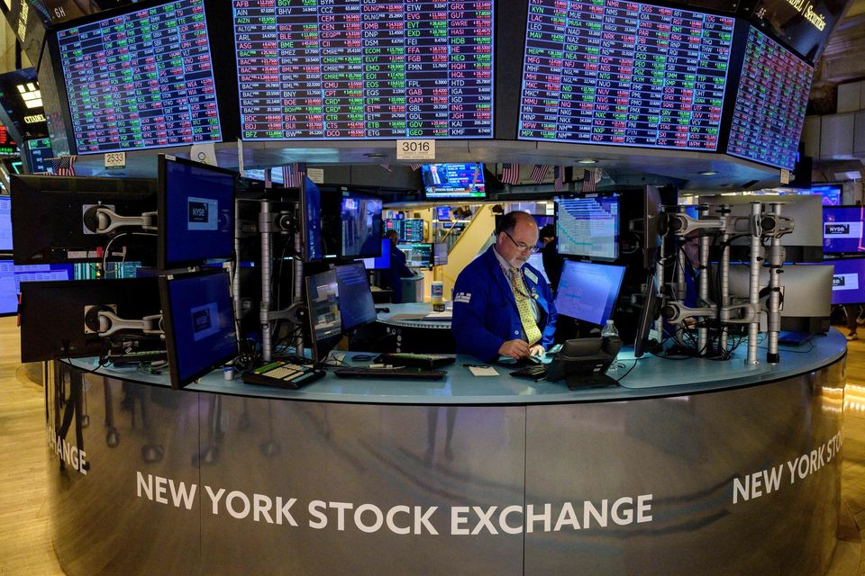 Wall St traders. Photo: Angela Weiss/AFP