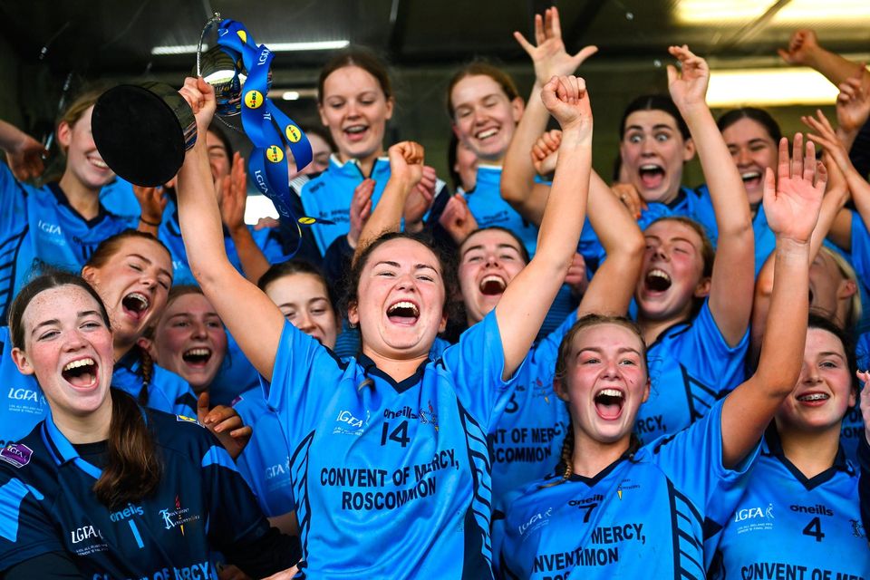 Convent of Mercy, Roscommon captain Aisling Hanly lifts the trophy with her team-mates. Photo: David Fitzgerald/Sportsfile