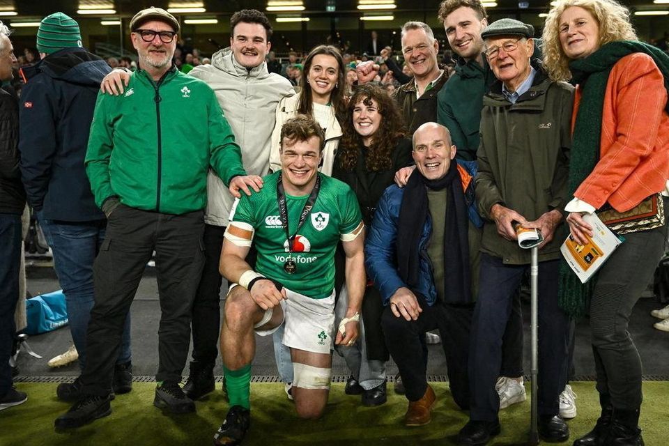 Josh van der Flier celebrating Ireland's Grand Slam victory with his family.