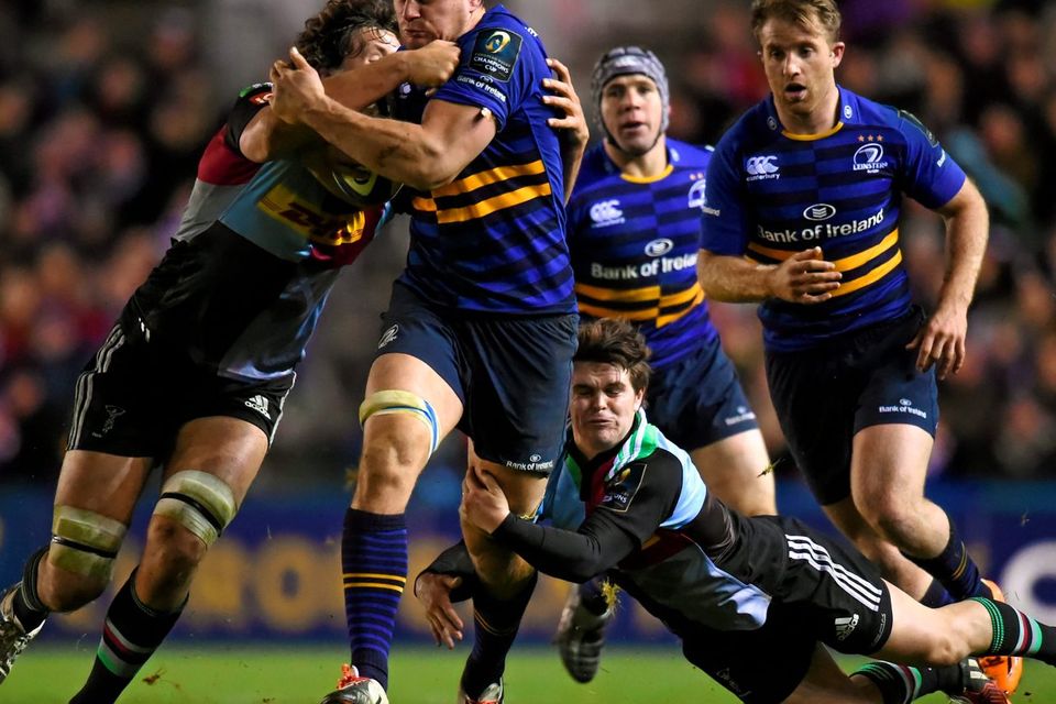 Leinster's Rhys Ruddock is tackled by Harlequins pair Charlie Matthews and Tim Swiel during their European Rugby Champions Cup clash at Twickenham Stoop. Photo: Stephen McCarthy / SPORTSFILE