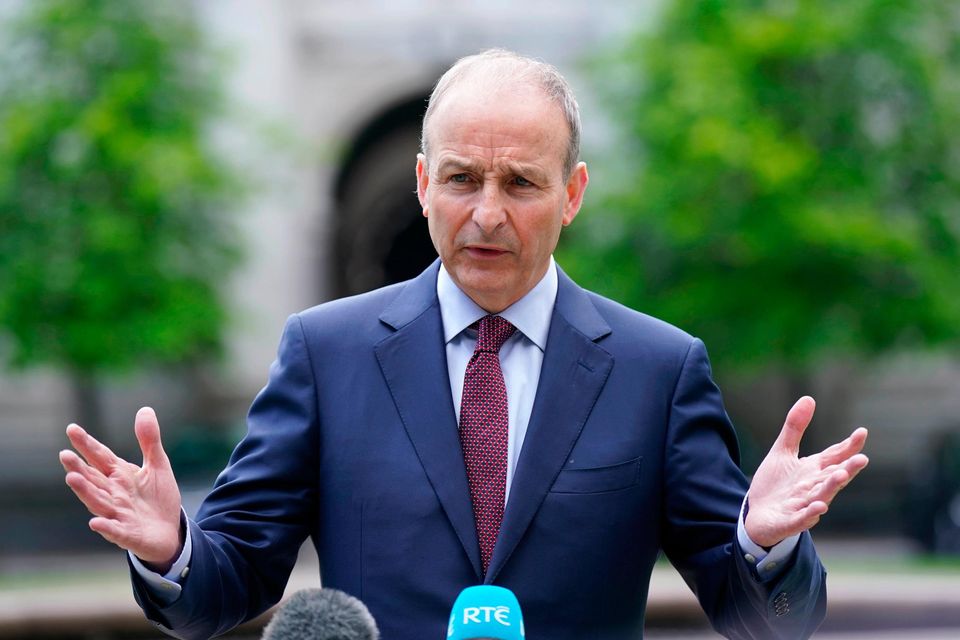 Taoiseach Micheál Martin speaking to the media outside the Government Buildings (Photo credit: Niall Carson/PA Wire)