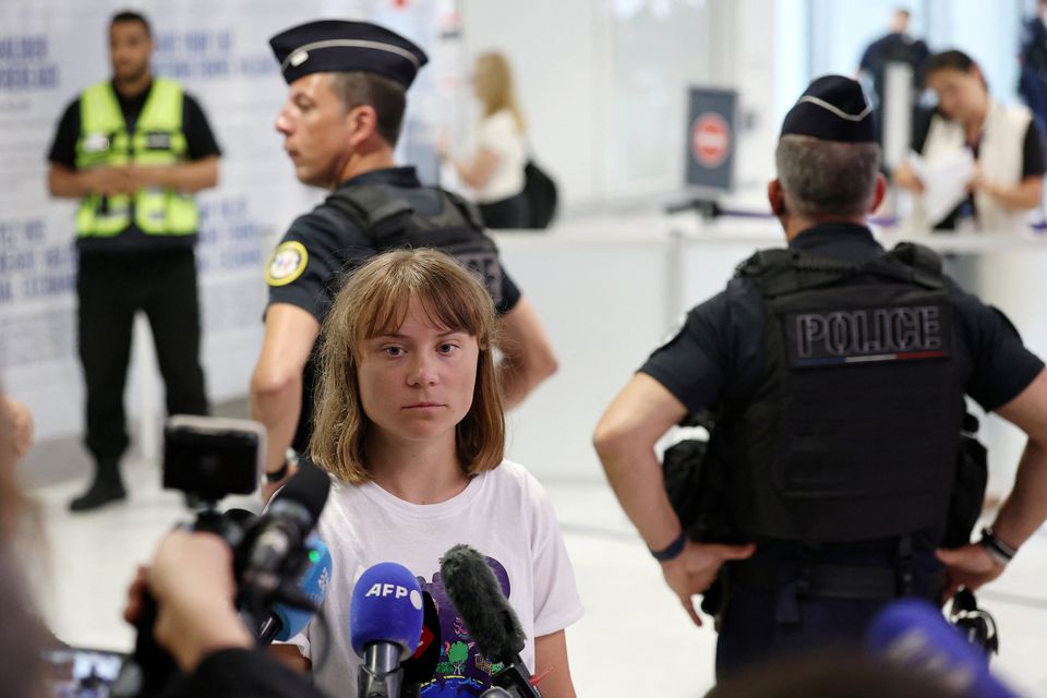 Greta Thunberg speaks to the media on arrival in Paris. Photo: Reuters