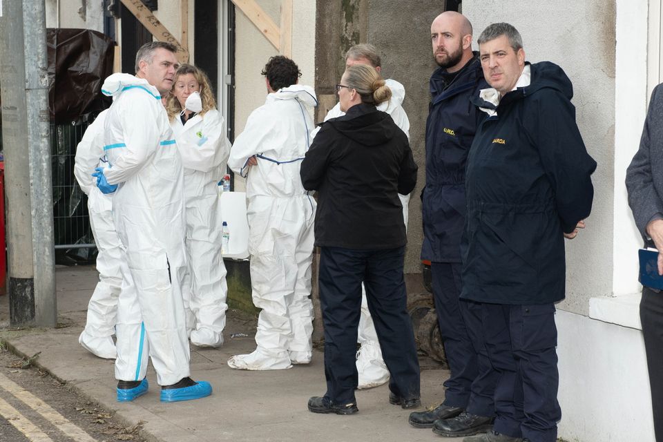 Garda forensics officers after human remains were found in the home of Richard Satchwell in 2023. Photo: Provision