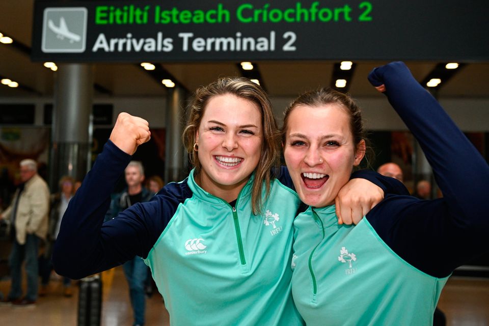 Béibhinn Parsons and Megan Burns pictured at Dublin Airport on the team's return from the World Rugby Sevens Series. Photo: Sportsfile