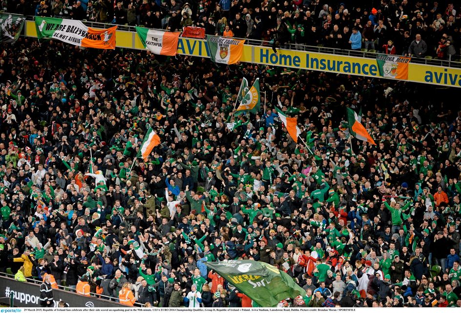 29 March 2015; Republic of Ireland fans celebrate after their side scored an equalising goal in the 90th minute. UEFA EURO 2016 Championship Qualifier, Group D, Republic of Ireland v Poland. Aviva Stadium, Lansdowne Road, Dublin. Picture credit: Brendan Moran / SPORTSFILE