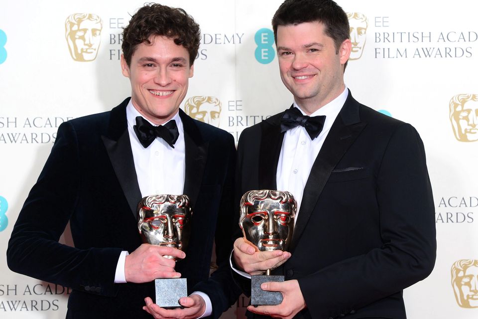Phil Lord and Christopher Miller (right), winners of the Best Animated Film award for the movie 'Lego Movie', at the EE British Academy Film Awards at the Royal Opera House, Bow Street in London. PRESS ASSOCIATION Photo. Picture date: Sunday February 8, 2015. See PA story SHOWBIZ Bafta. Photo credit should read: Dominic Lipinski/PA Wire