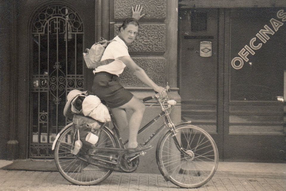 Travel writer Dervla Murphy cycling in Barcelona in the mid-1950s