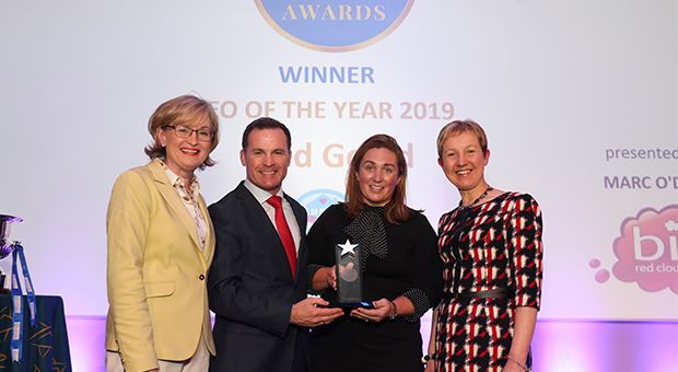 CEO of Comfort Keepers Bríd Gould is awarded her CEO of the Year at the All-Ireland Business Awards. Pictured from left are Mairead McGuinness (Vice-President of the European Parliament), Mark Dwyer (Former CEO of the Year at the All-Ireland Business Awards), Bríd Gould and Dr Brigid Hynes (University of Limerick)