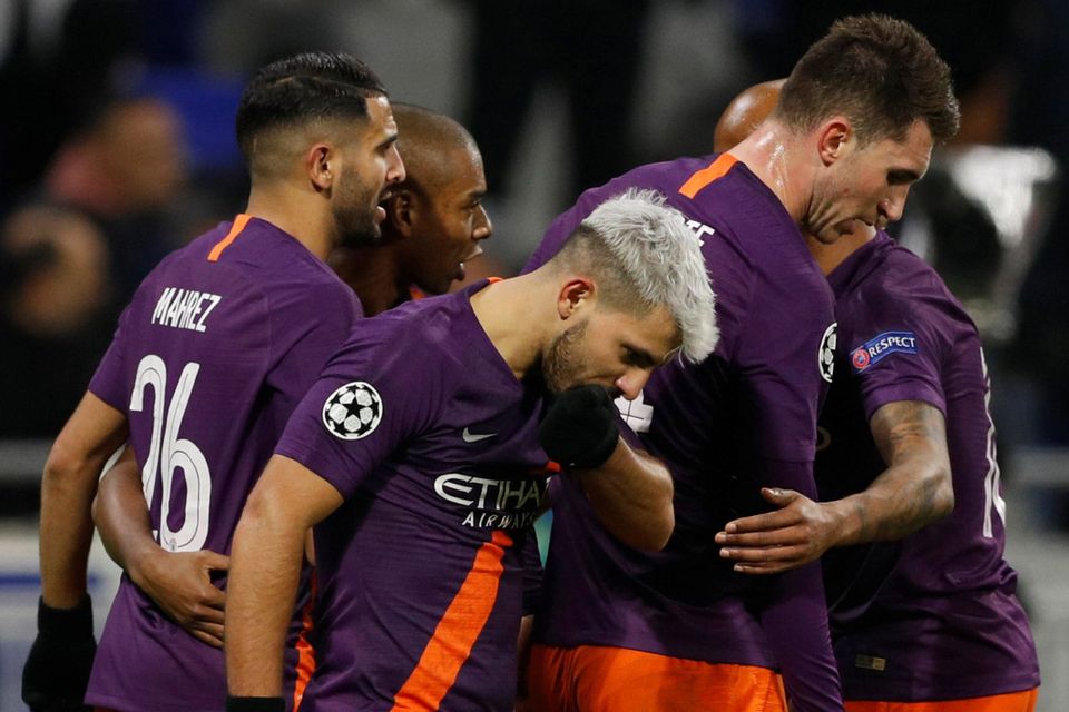 LEVELLER: Manchester City celebrate Sergio Aguero’s equaliser against Lyon last night. Photo: REUTERS