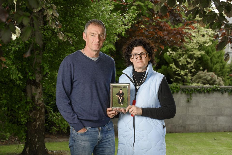 Tom and Hannah Sheehan, with a photo of their late son Darragh, in Doneraile, Co Cork. Photo: Daragh Mc Sweeney/Provision