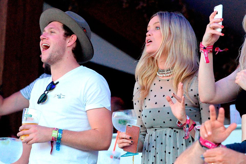 Niall Horan and Laura Whitmore sing along with Tom Petty as they attend the Barclaycard Exclusive British Summer Time Festival at Hyde Park on July 9, 2017 in London, England.  (Photo by Eamonn M. McCormack/Getty Images for Barclaycard)