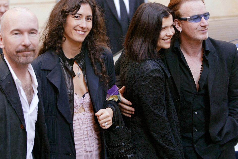 The Edge, his wife Morleigh Steinberg, Bono with his wife Ali at the wedding of f Luciano Pavarotti in 2003.