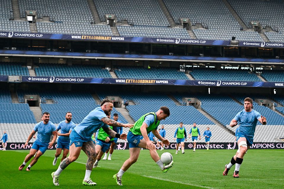 Luke McGrath and Andrew Porter playing Gaelic football during Leinster's captain's run at Croke Park. Photo: Harry Murphy/Sportsfile
