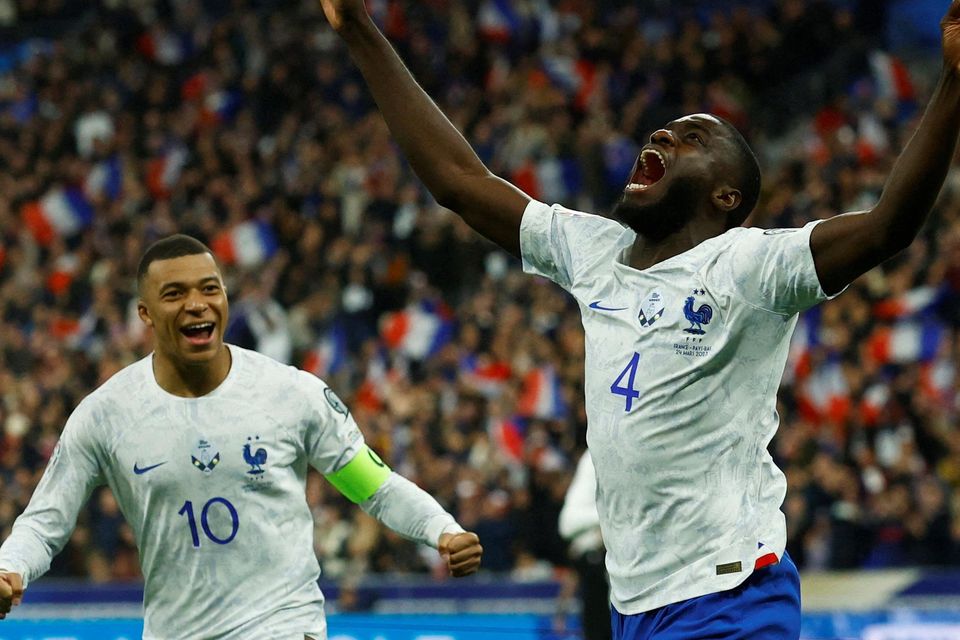 France's Dayot Upamecano celebrates scoring their second goal against the Netherlands with Kylian Mbappe, who scored twice on Friday night. Photo: Reuters