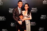 thumbnail: Real Madrid and Portugal forward Cristiano Ronaldo (L) poses for a photograph with partner Georgina Rodriguez (R) and his son Cristiano Ronaldo Jr as he arrives for The Best FIFA Football Awards ceremony, on October 23, 2017 in London. / AFP PHOTO / Glyn KIRKGLYN KIRK/AFP/Getty Images