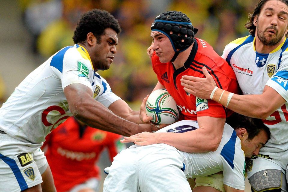 Munster’s Tommy O’Donnell tries to find a way through the Clermont defence of Napolioni Nalaga, Morgan Parra (centre) and Julien Bardy during the 2013 Heineken Cup semi-final – the sides lock horns again at Thomond Park this Saturday