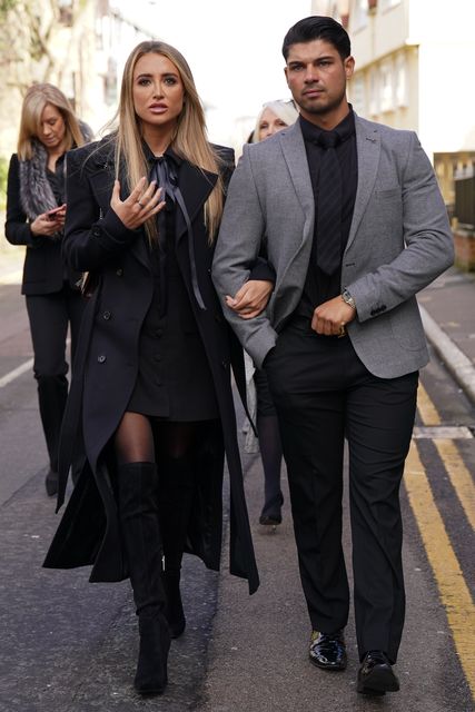 Georgia Harrison and Anton Danyluk outside Chelmsford Crown Court, Essex, after the adjournment of a confiscation hearing for her former partner, Stephen Bear, following his conviction for voyeurism and two counts of disclosing private sexual photographs and films with intent to cause distress (Lucy North/PA)