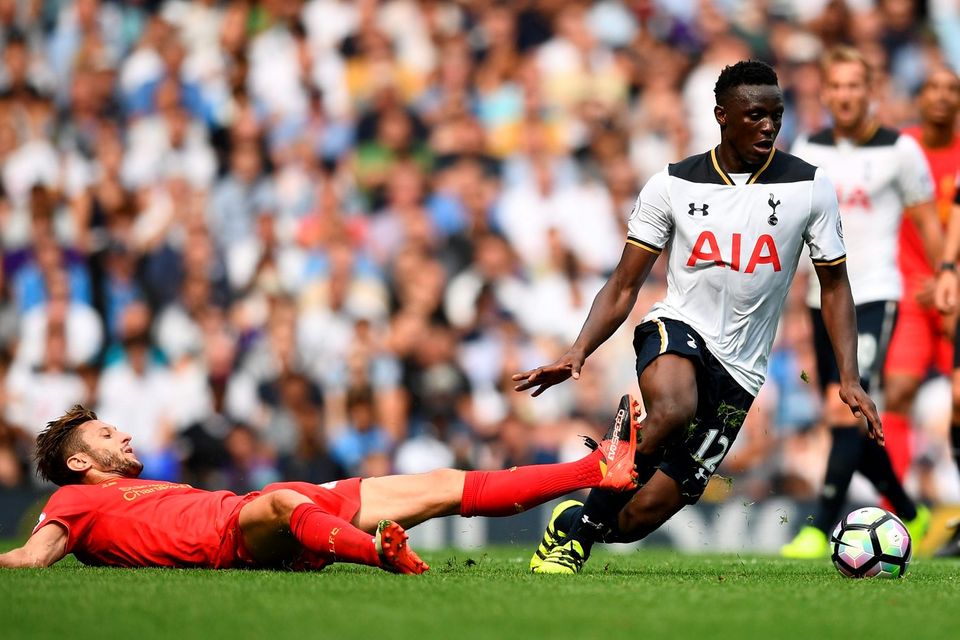 Tottenham's Victor Wanyama in action with Liverpool's Adam Lallana. Photo: Dylan Martinez