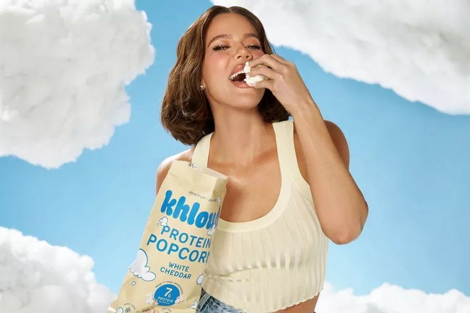 Khloe Kardashian promotes her Khloud Protein Popcorn