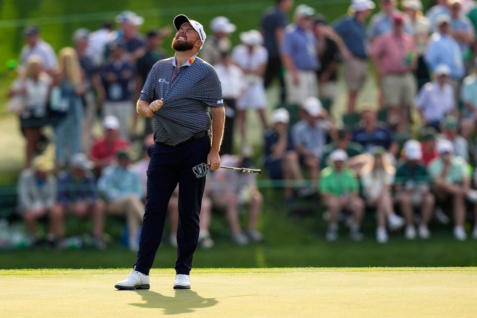 Shane Lowry, of Ireland, reacts after missing a putt on the 15th hole during the first round at the Masters golf tournament. (AP Photo/David J. Phillip)