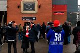 thumbnail: Fans arrive at Old Trafford in Manchester for the 60 Years Since The Munich Air Disaster commemorative ceremony. PRESS ASSOCIATION Photo. Picture date: Tuesday February 6, 2018. See PA story SOCCER Man Utd. Photo credit should read: Simon Peach/PA Wire.