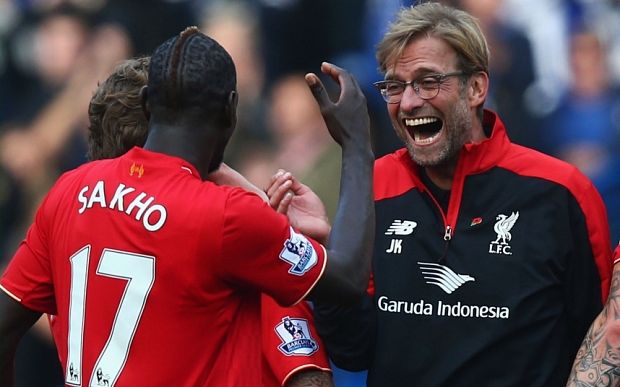 Liverpool manager Jurgen Klopp celebrates his team's 3-1 win over Chelsea with Mamadou Sakho