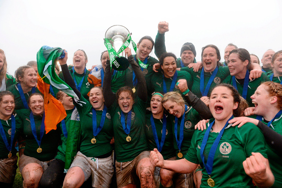 CHAMPIONS: Ireland captain Fiona Coghlan lifts the Six Nations Trophy as her team-mates celebrate the Grand Slam victory in 2013. Picture credit: Matt Browne / Sportsfile