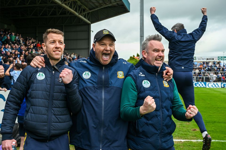 Meath manager Robbie Brennan celebrates winning a late free with Shane Supple and Karl Manning. Photo: Ray McManus/Sportsfile