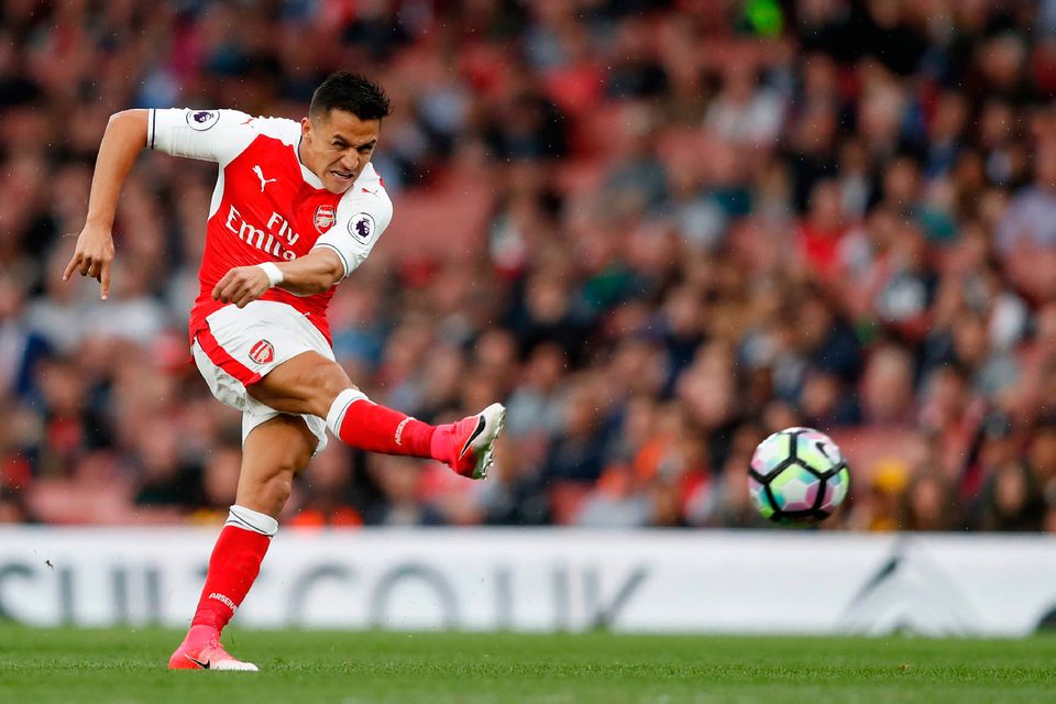 There have been questions over whether Alexis Sanchez would remain at Arsenal this summer Photo: ADRIAN DENNIS/AFP/Getty Images