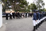 thumbnail: Family members carry Dawn's coffin into the church as Killinick Pony Club members form a guard of honour.