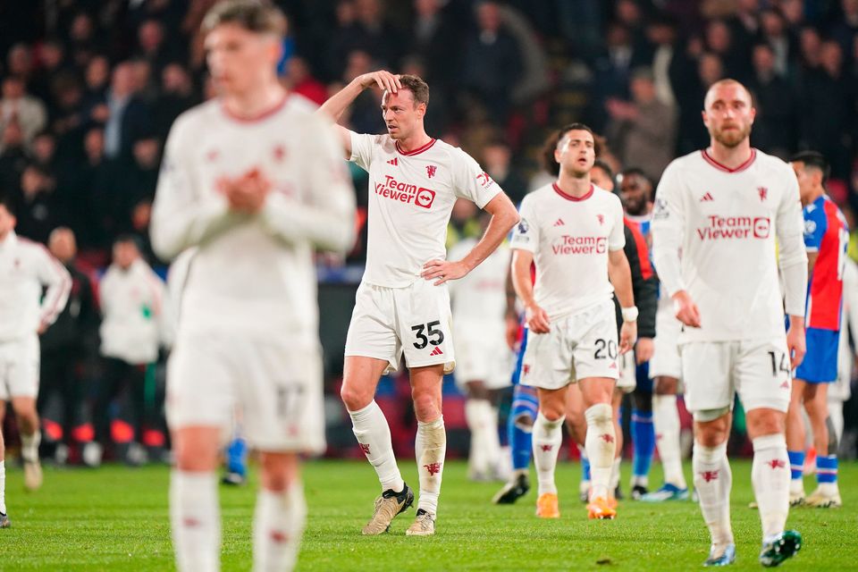 Manchester United's Jonny Evans (centre) reacts following the Premier League match at Selhurst Park, London