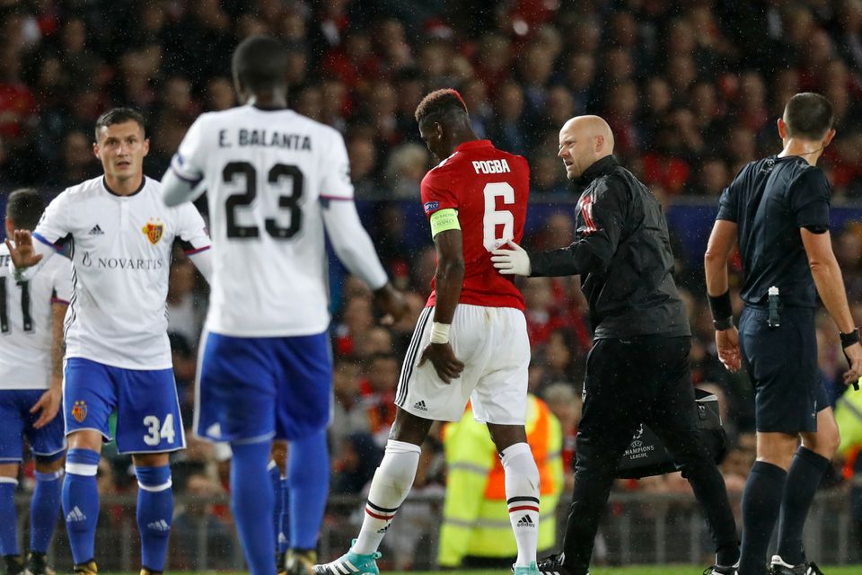 Manchester United's Paul Pogba limps off with a hamstring injury against Basle