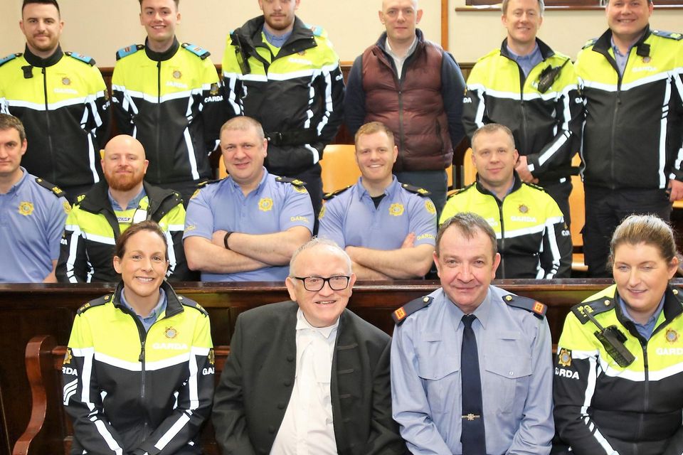 Judge Brian Sheridan pictured with members of An Garda Síochána at his retirement gathering in Mallow Courthouse on Tuesday morning