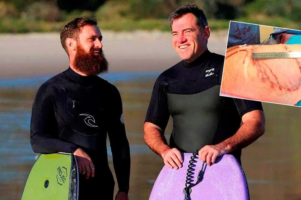 Best friends Shane De Roiste (left) and Dale Carr were surfing 200m from shore when a great white latched on to Dale’s thigh and buttocks
