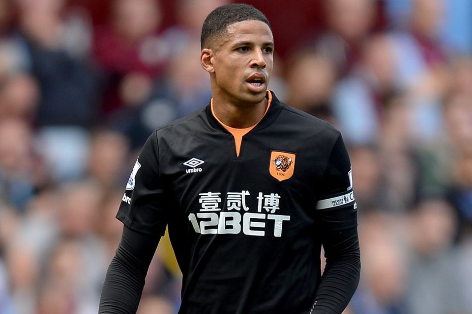 Curtis Davies, pictured, is delighted Mohamed Diame is a Hull player and not appearing for Arsenal