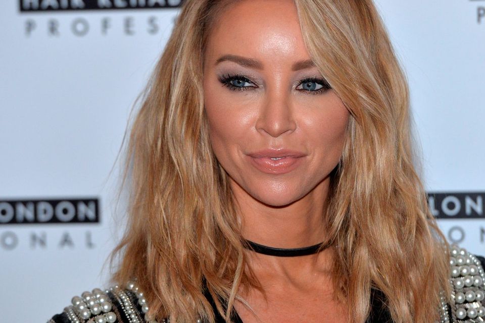 Lauren Pope attends a photocall to launch her Academy for Hair Rehab London at Sanctum Soho on November 12, 2015 in London, England.  (Photo by Anthony Harvey/Getty Images)