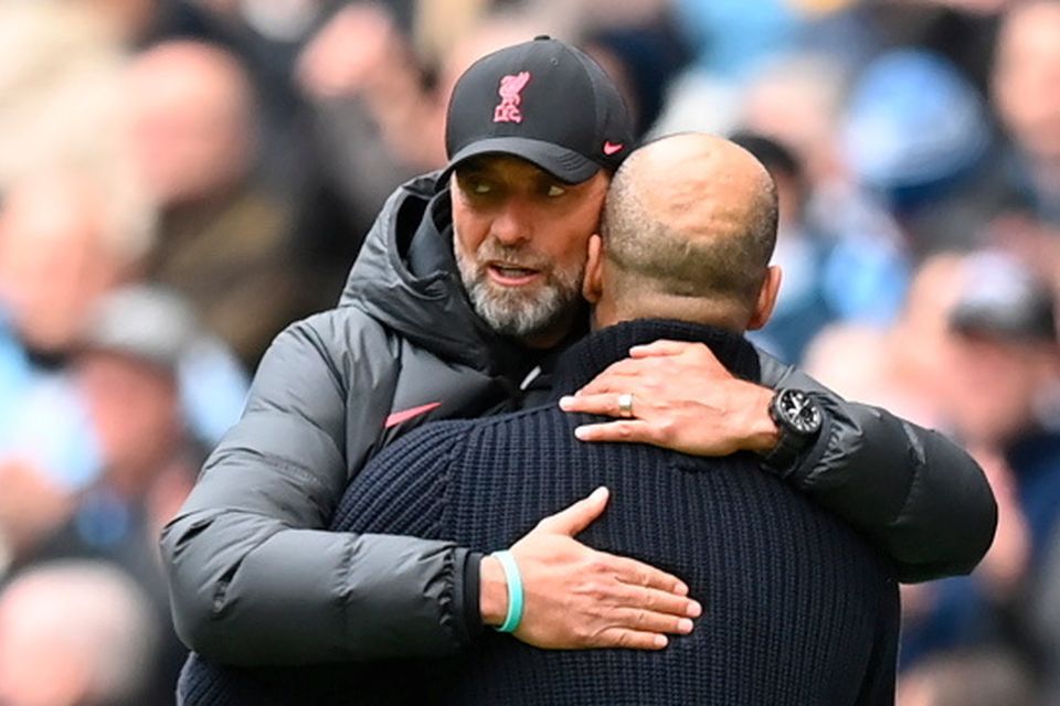 Jurgen Klopp embraces Pep Guardiola at the Etihad