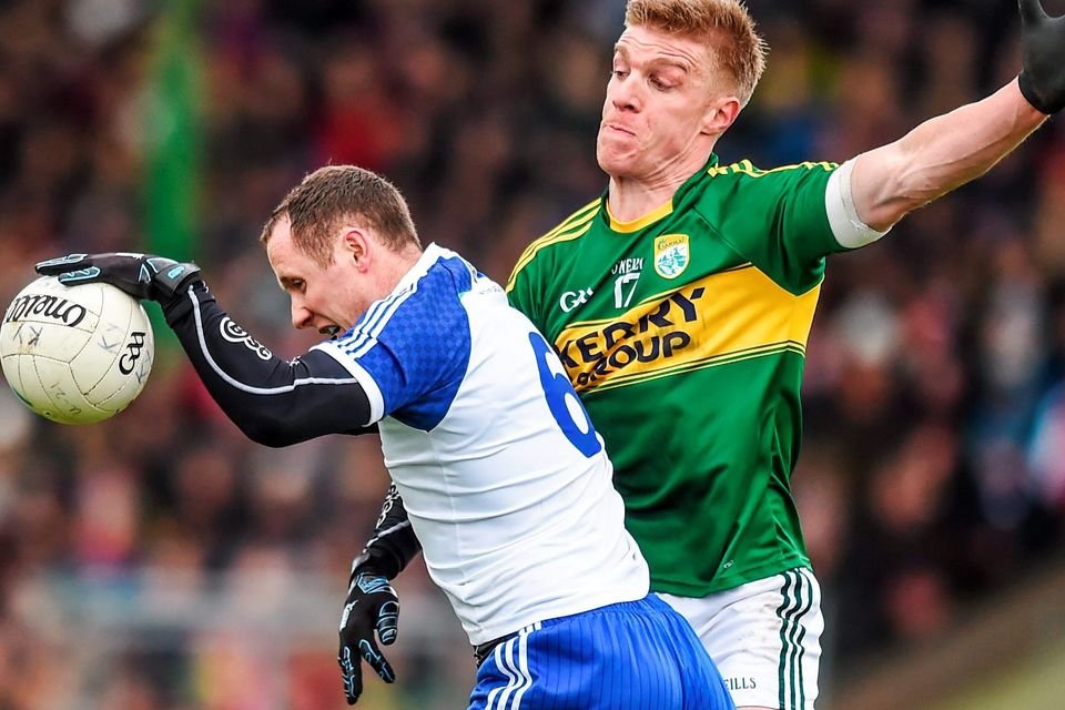 Monaghan's Vinny Corey in action against Tommy Walsh of Kerry