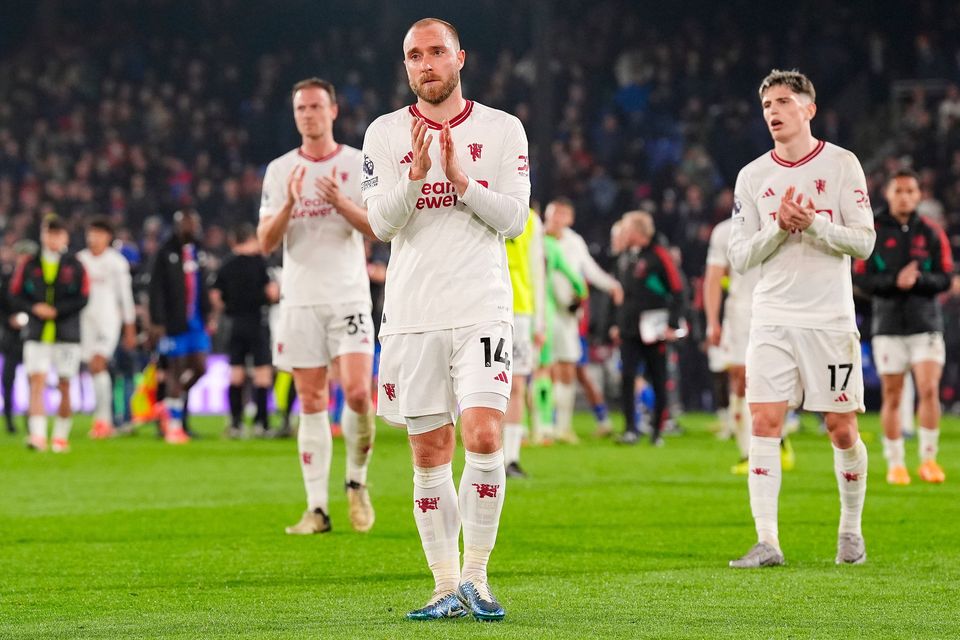 Manchester United's Christian Eriksen (centre) applauds the fans following the Premier League defeat by Crystal Palace match at Selhurst Park. Photo: Zac Goodwin/PA