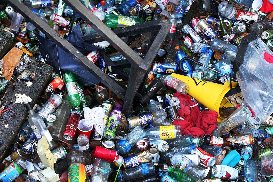 The basement of 37 Harcourt Street which is covered in beer cans and rubbish